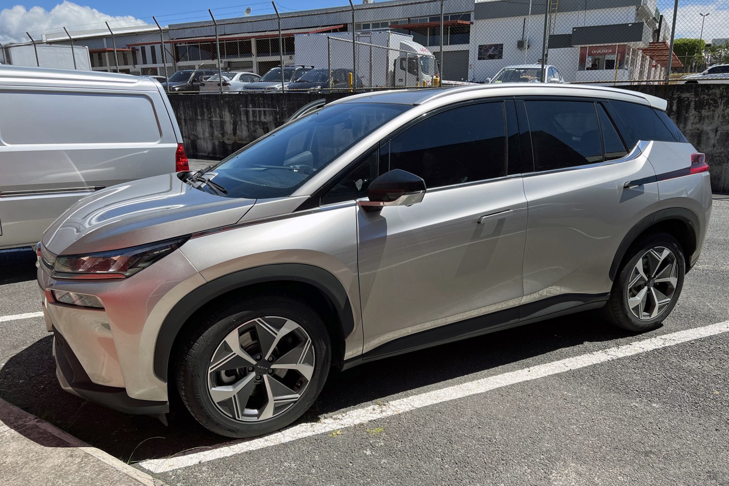 Silver crossover SUV with sporty alloy wheels and sleek tinted windows.