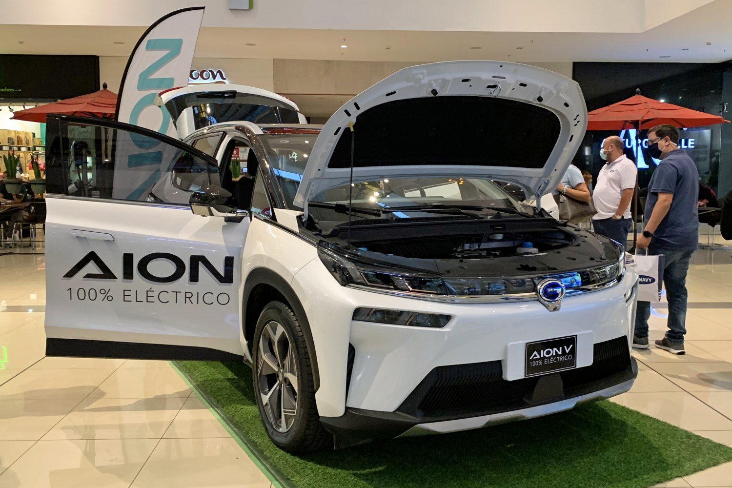 Electric SUV with open hood and front door