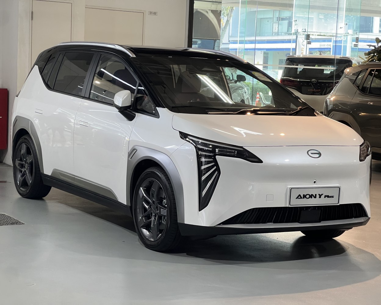 Sleek front fascia with angular LED headlights and black roof detailing