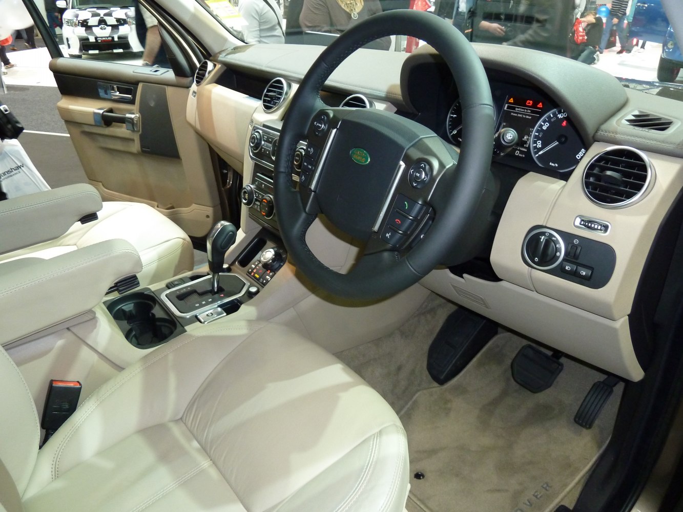 Tan leather interior with steering wheel and gear shift