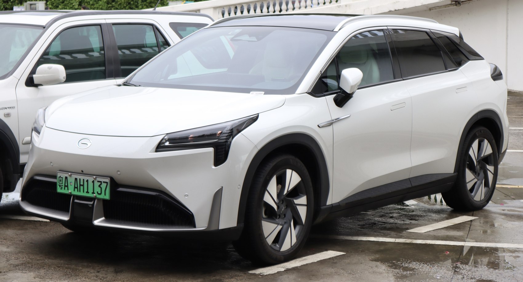 White electric SUV with LED headlights and aerodynamic design