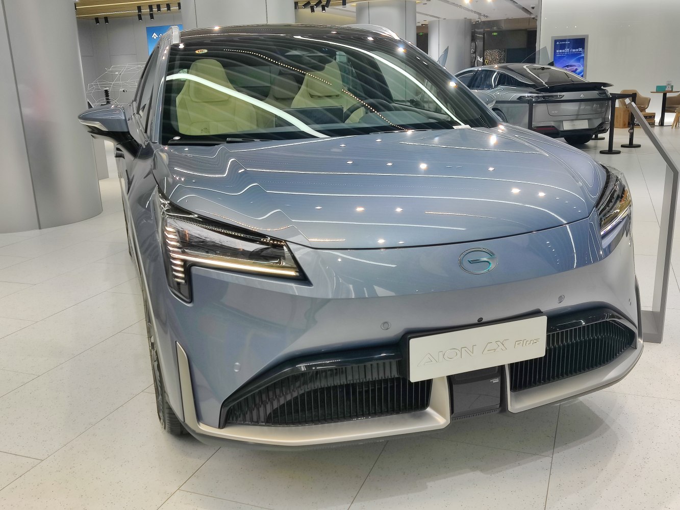 Front view with angular LED headlights and prominent grille