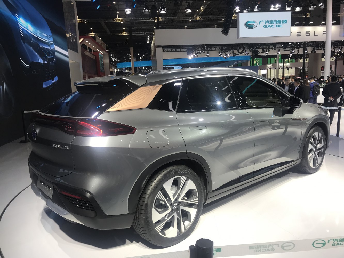 Rear and side view of an electric SUV with sleek LED taillights and alloy wheels