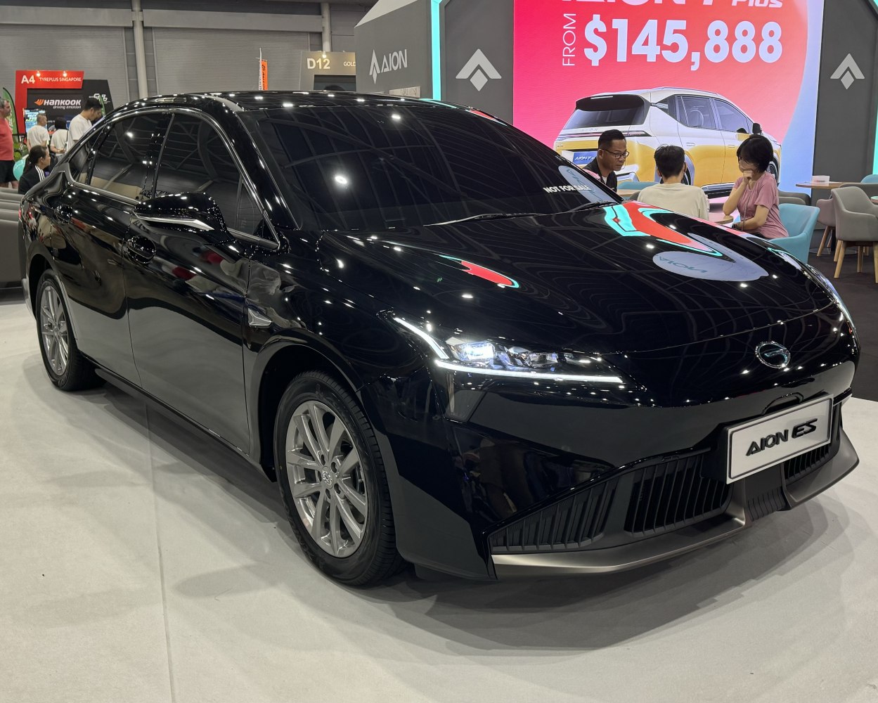 Sleek electric sedan with aerodynamic shape and LED headlights