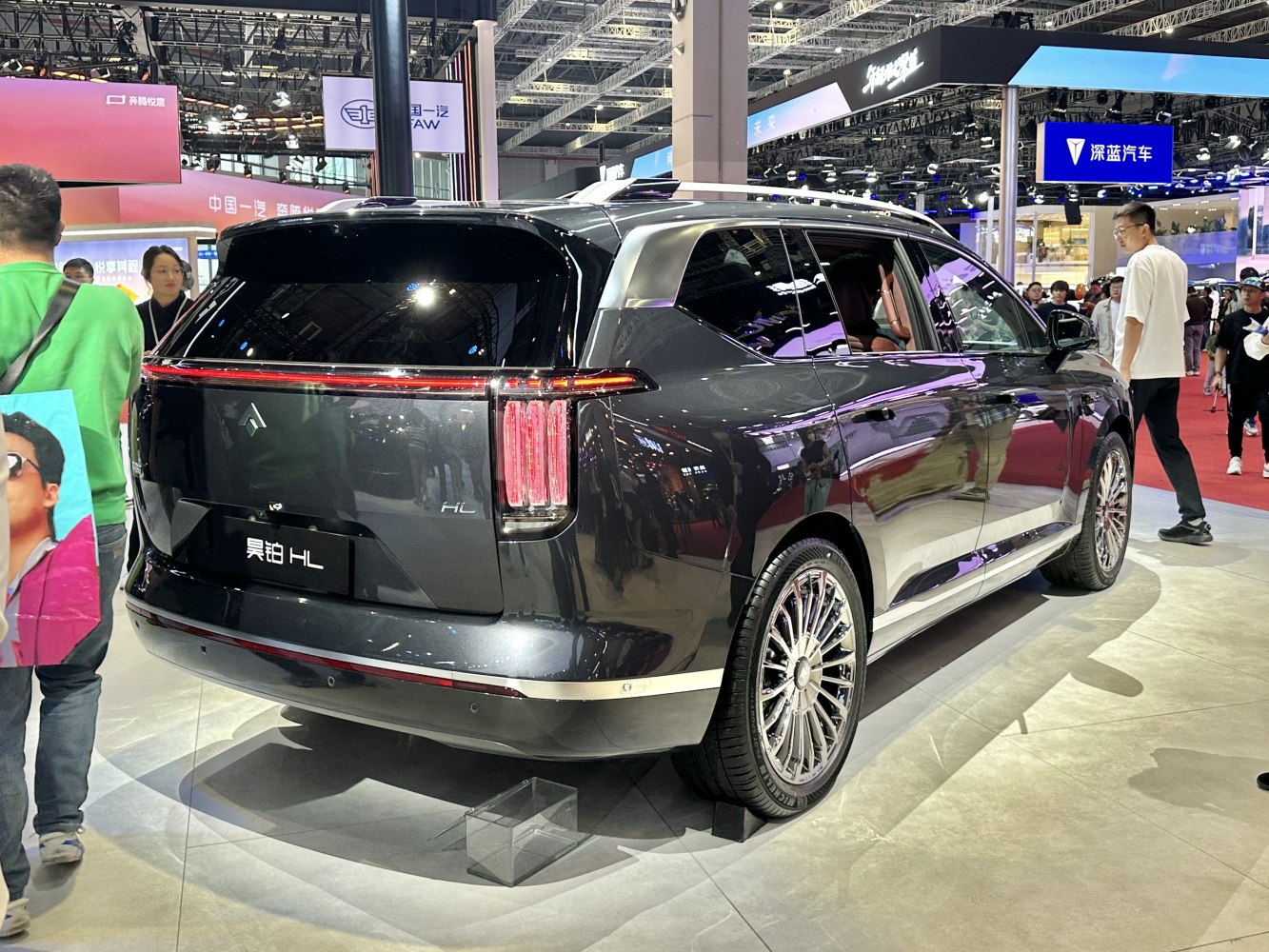 Rear view with vertical tail lights, multi-spoke alloy wheels