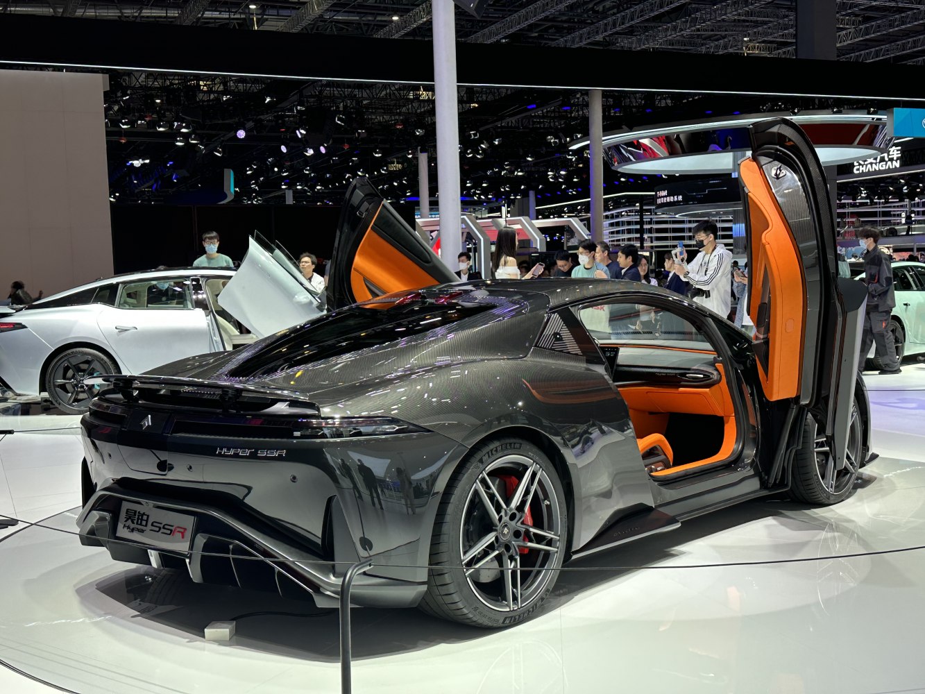 Gullwing doors and aerodynamic rear design in a sports coupe