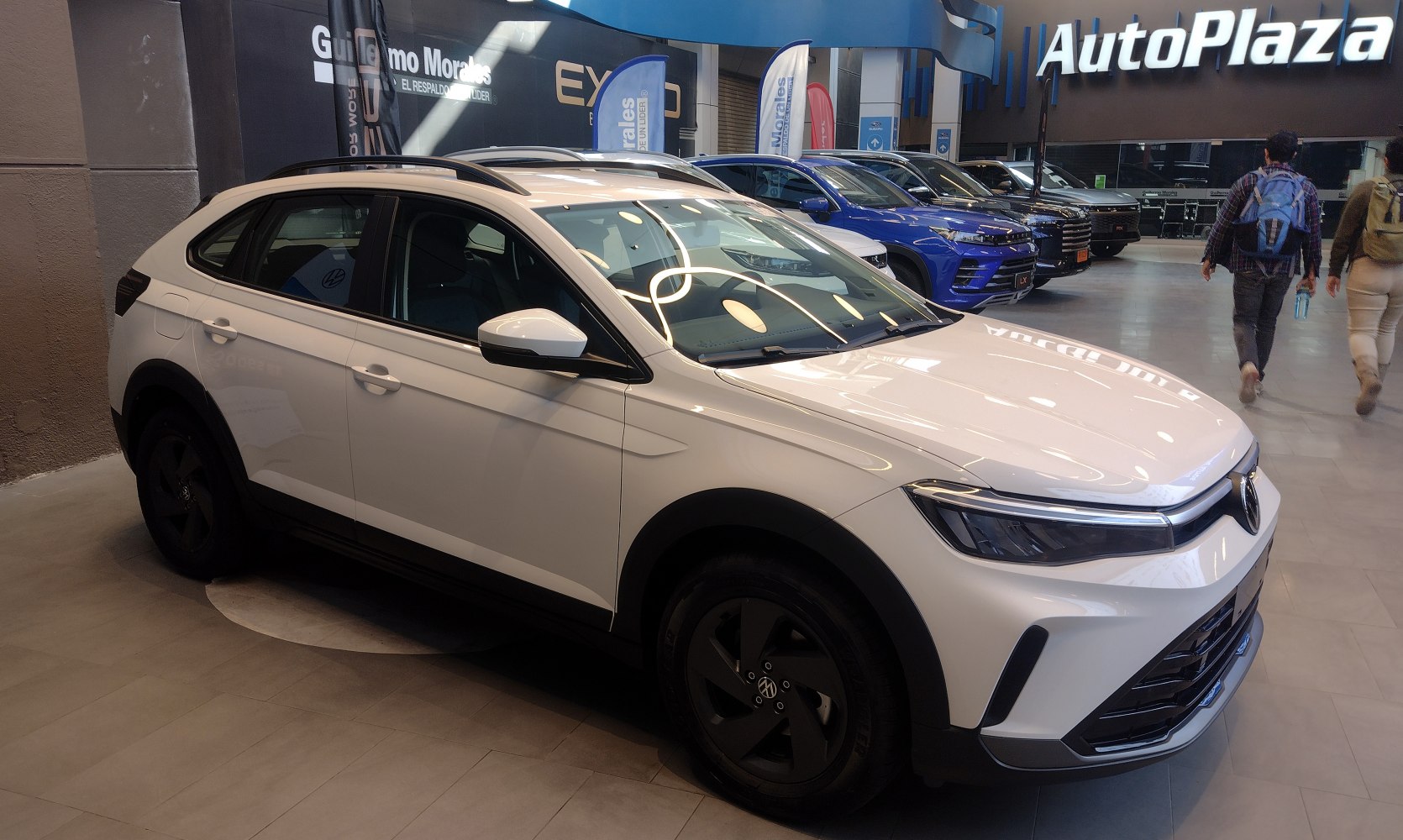 Front-side exterior view of modern crossover with sleek design