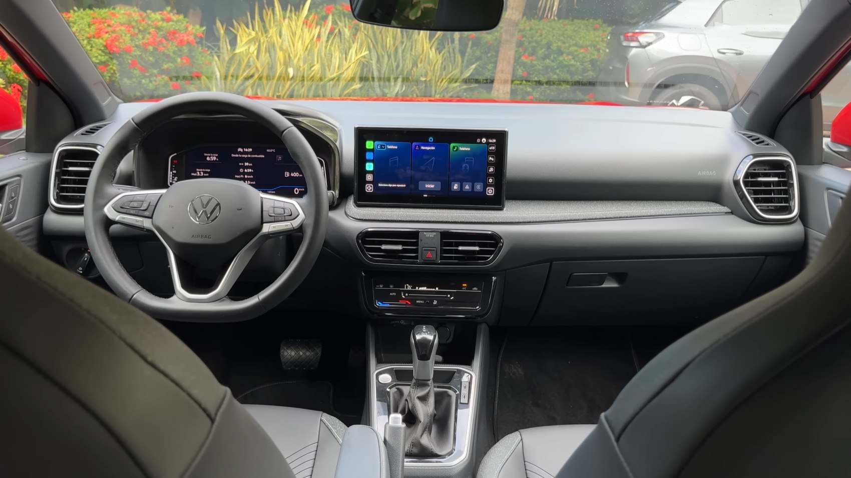 Modern car interior with digital dashboard and touchscreen infotainment