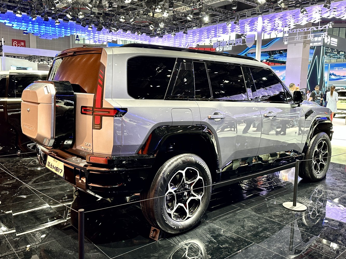 Angular rear and side view of modern SUV with unique taillights and rugged wheels
