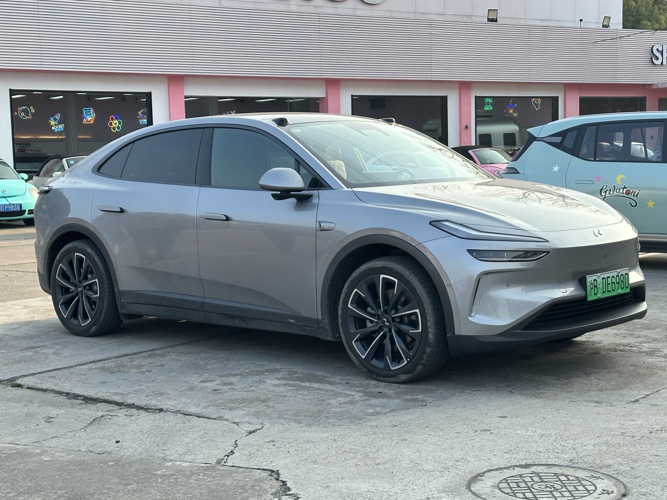 Sleek electric crossover with smooth aerodynamic profile and modern LED lighting
