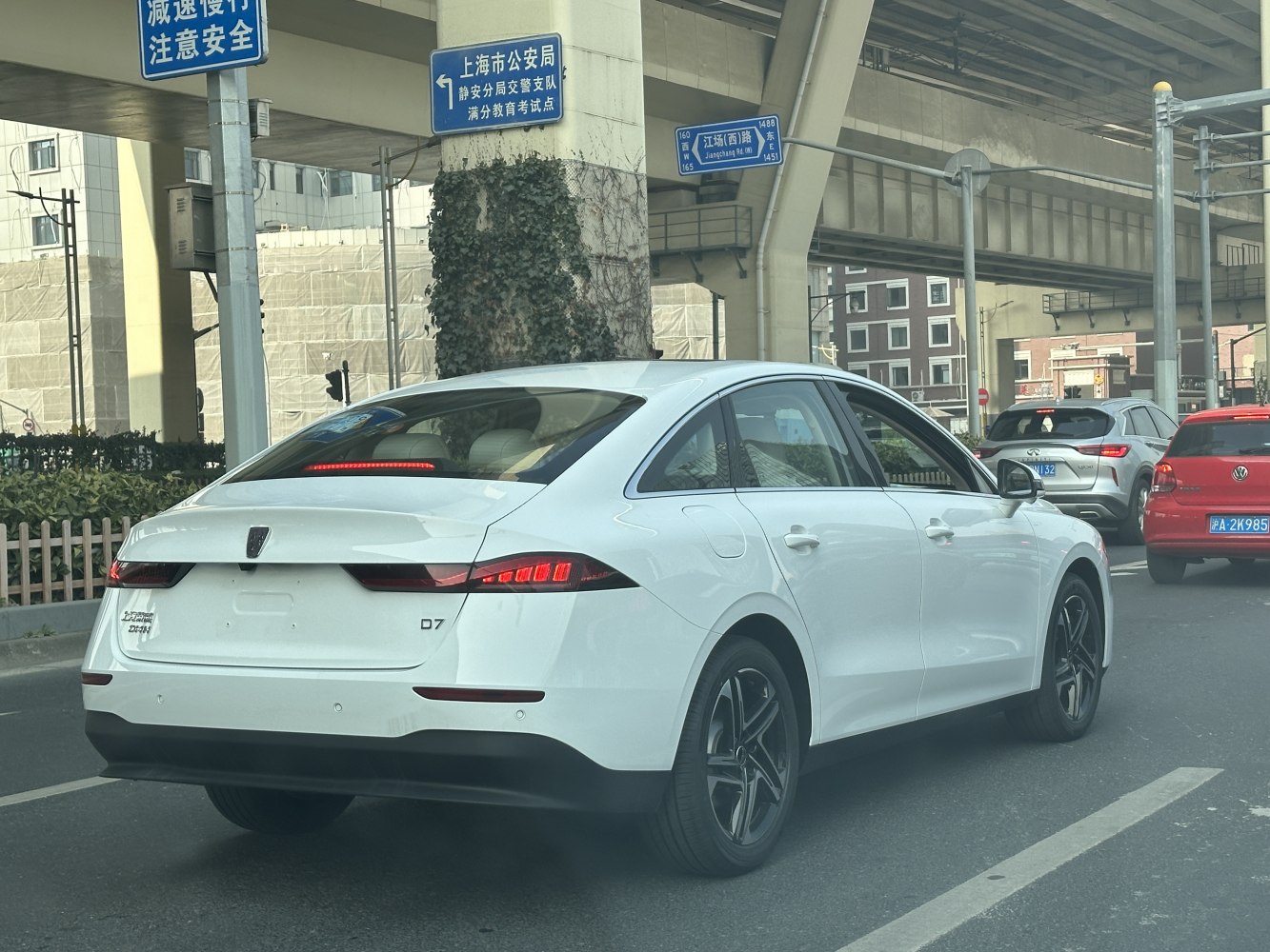 Rear view of a sedan with sleek taillights and smooth body lines