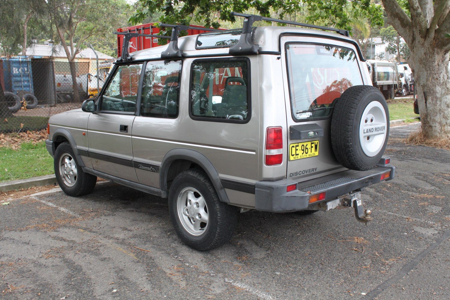 Rear spare tire and roof rack on a rugged SUV design