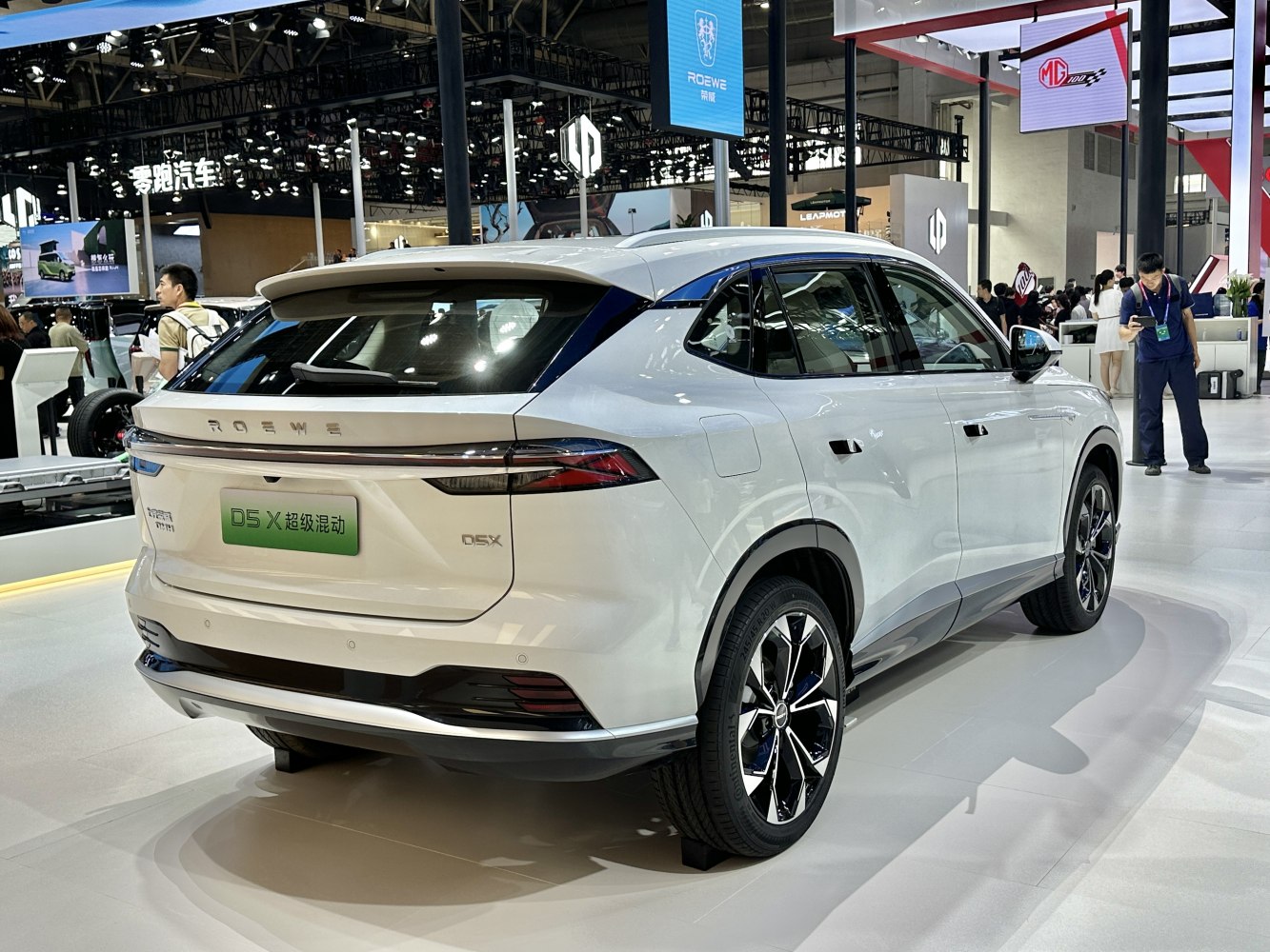 Rear and side view of a modern SUV with sleek taillights and stylish alloy wheels.