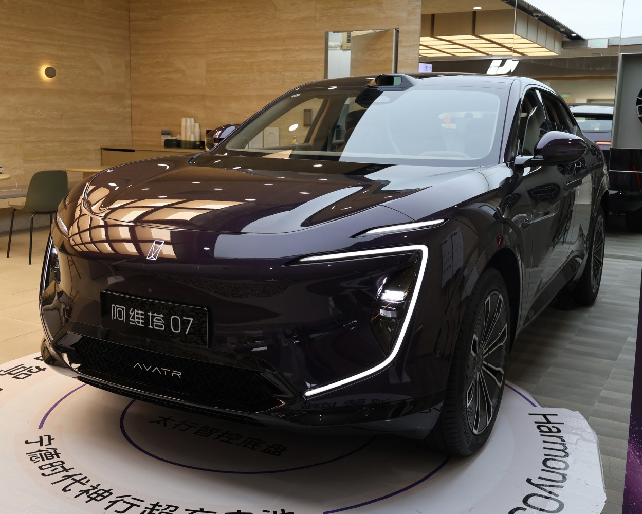 Sleek electric SUV front with distinct LED headlights and aerodynamic design.