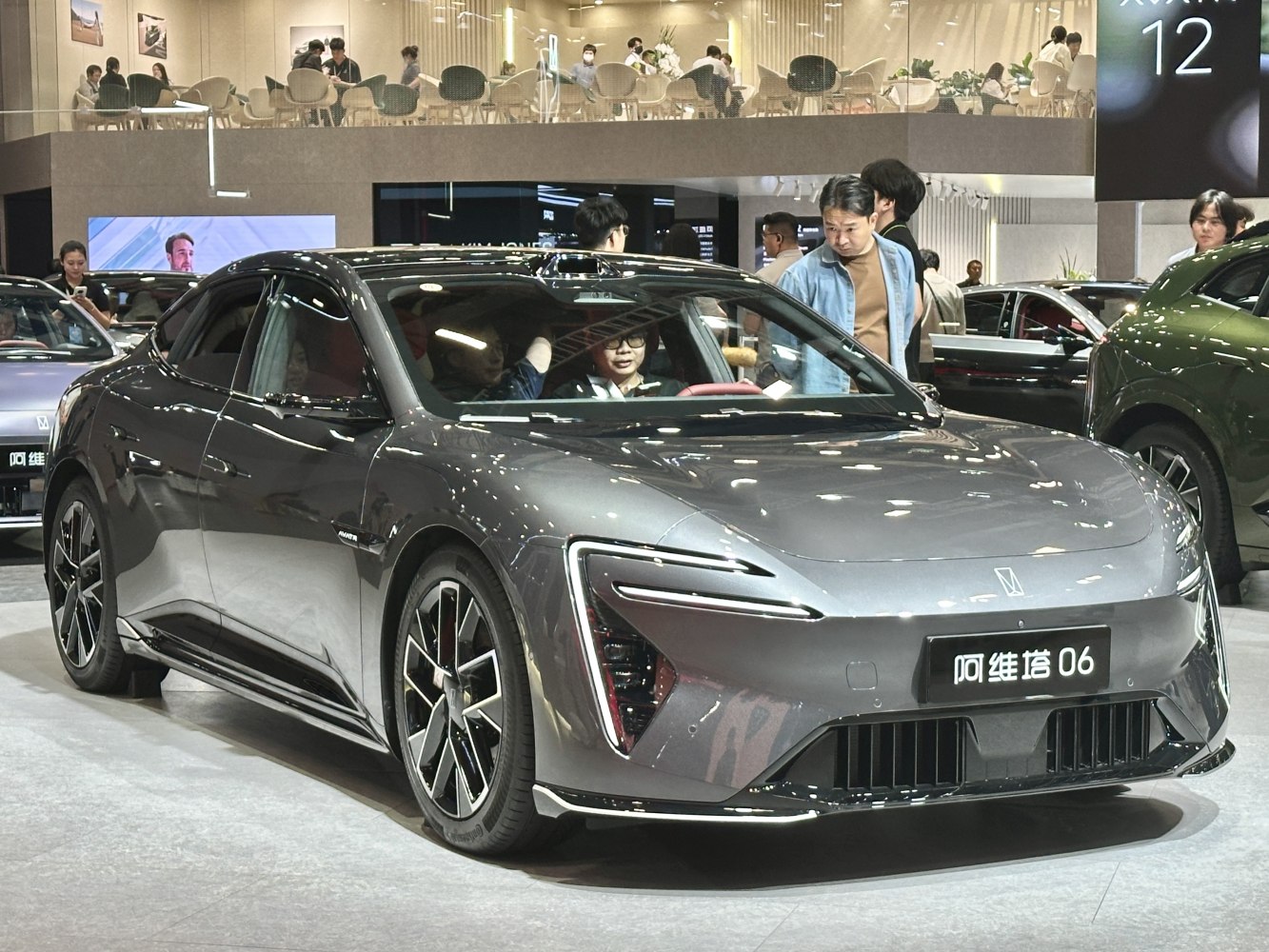 Sleek electric sedan with sharp LED headlights and aerodynamic styling