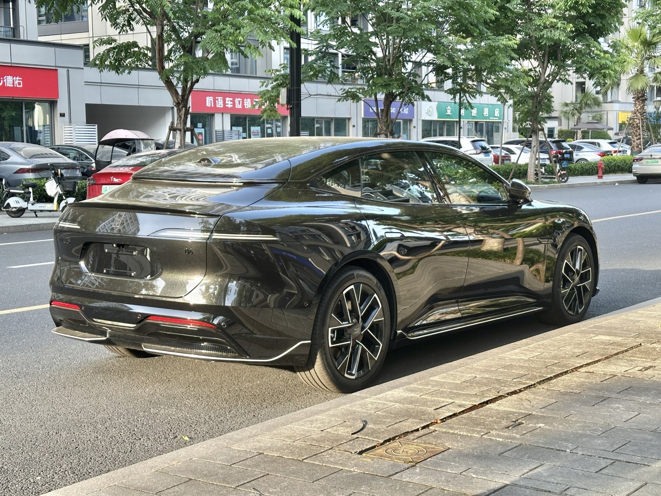 Sleek rear design and alloy wheels on modern sedan