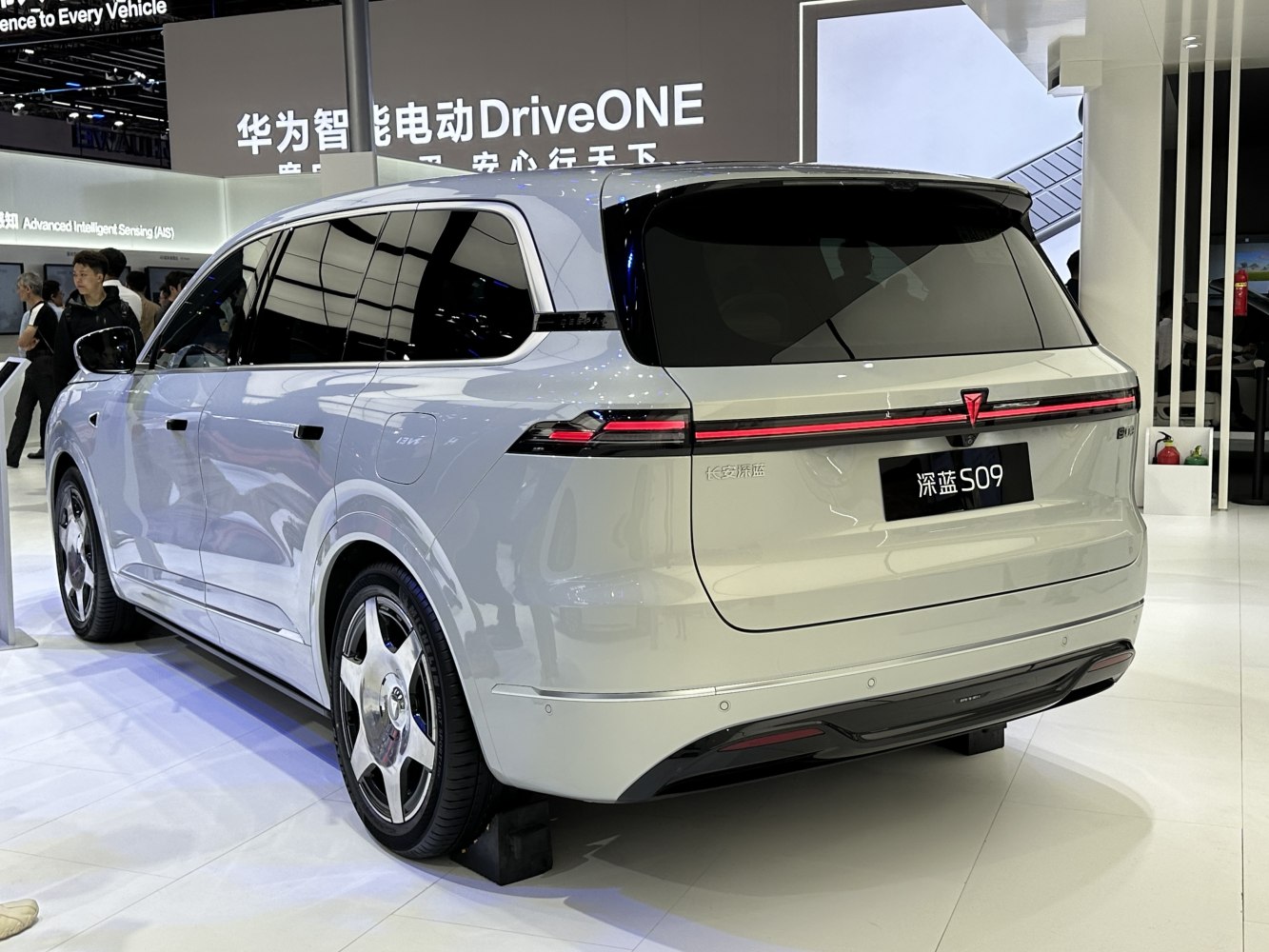 Rear view of electric SUV with continuous LED light bar and aerodynamic rear design
