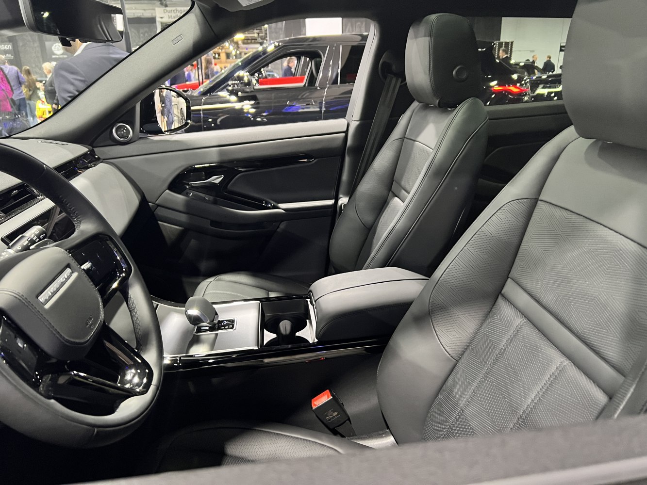 Premium leather seats and modern dashboard with center console and gear selector