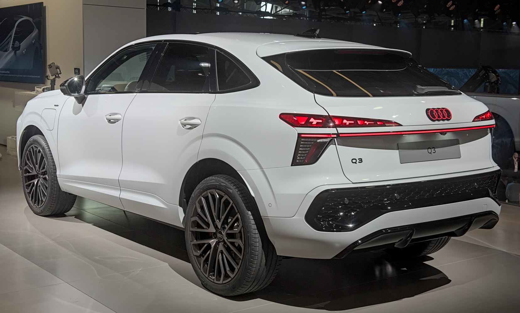 Rear and side view of a modern SUV with LED taillights and sportback design