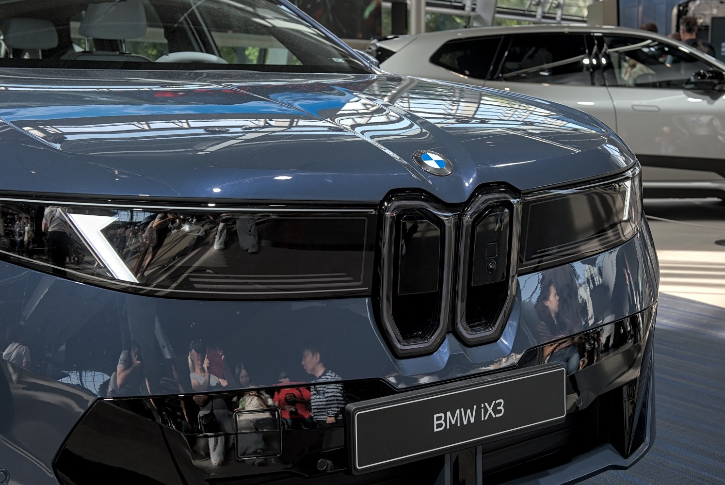 Close-up of front grille and LED headlight design.