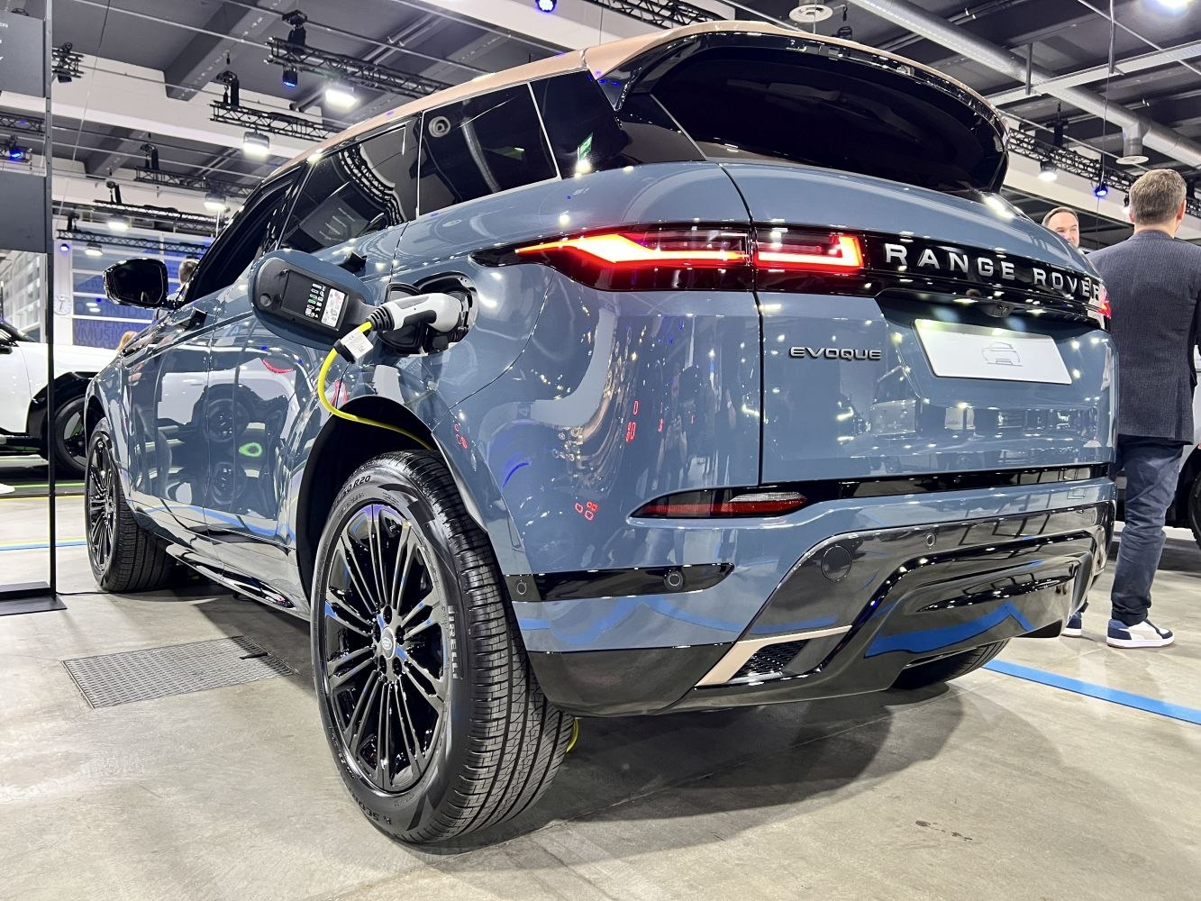 Rear view with illuminated taillights and electric charging port