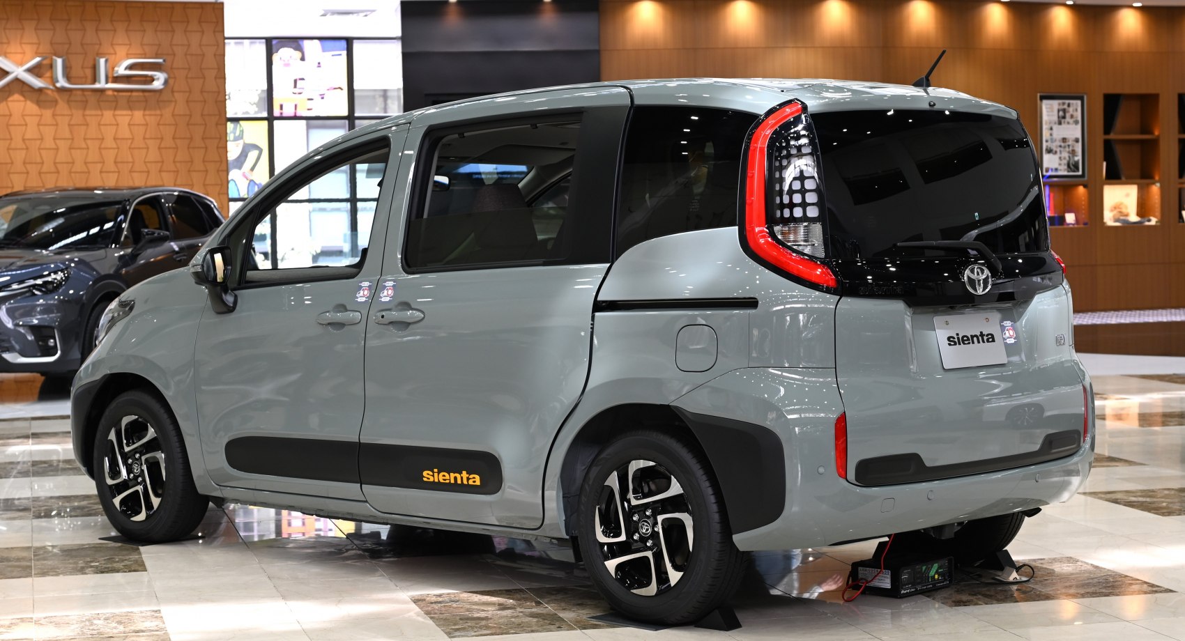 Compact minivan with vertical rear taillights and sliding doors