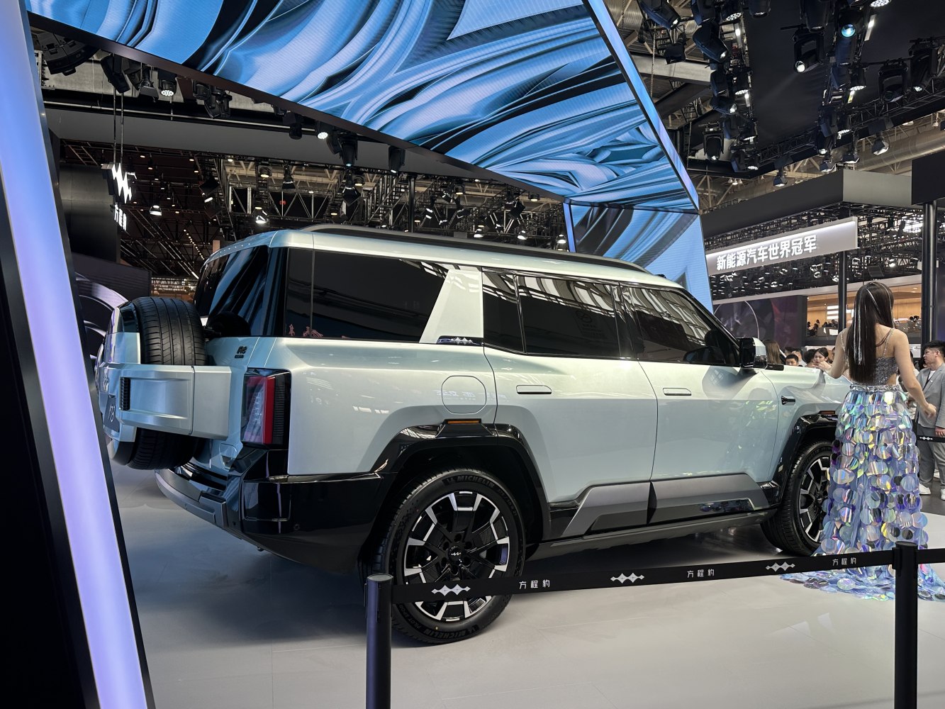 Boxy SUV design with rear spare tire and tinted windows