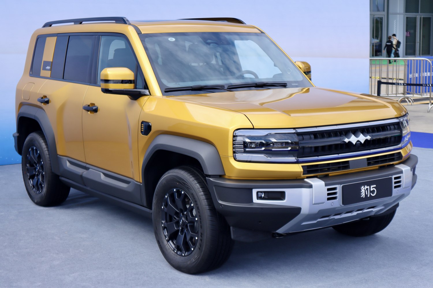 Boxy SUV with modern grille and all-terrain wheels