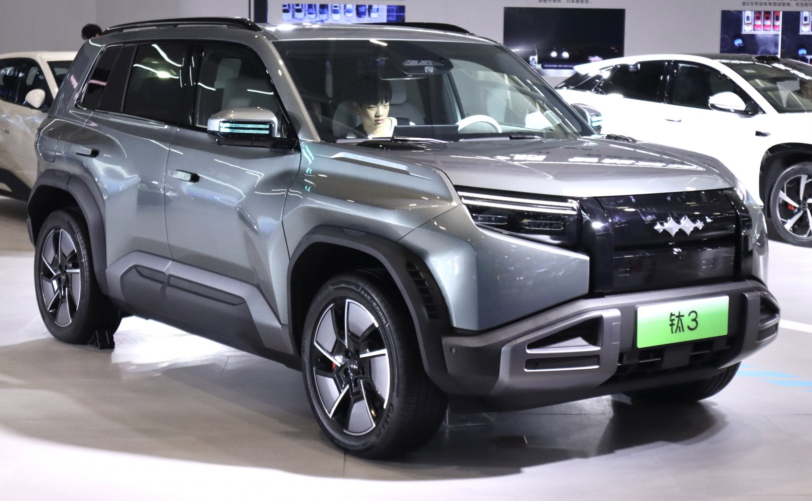Front and side profile of modern SUV with bold, angular design and alloy wheels