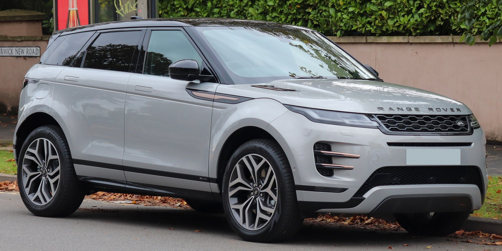 Front and side view of a modern SUV with distinctive alloy wheels