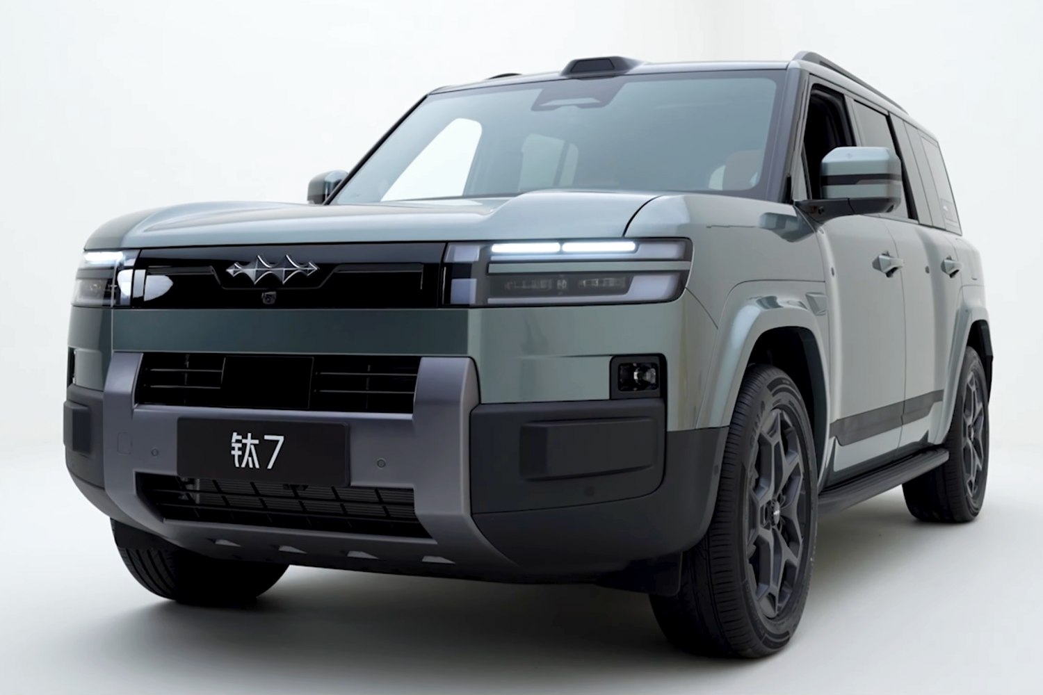 Front view of SUV with LED headlights and bold grille