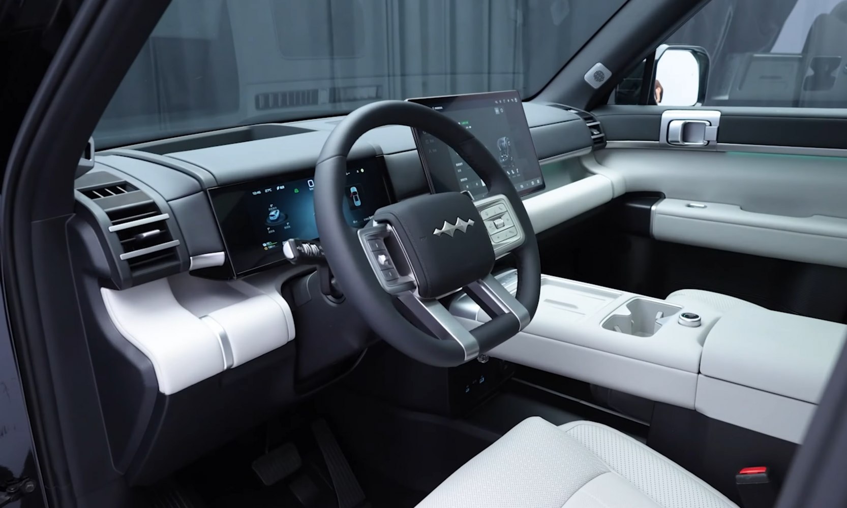 Modern digital dashboard and large touchscreen infotainment system with minimalist interior design