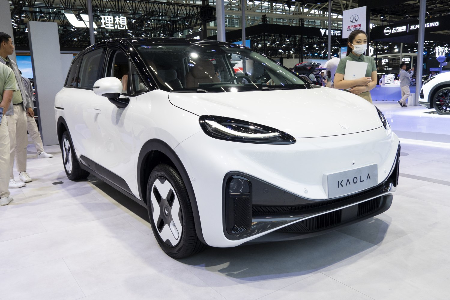 Sleek electric compact crossover SUV with LED headlights and unique wheel design