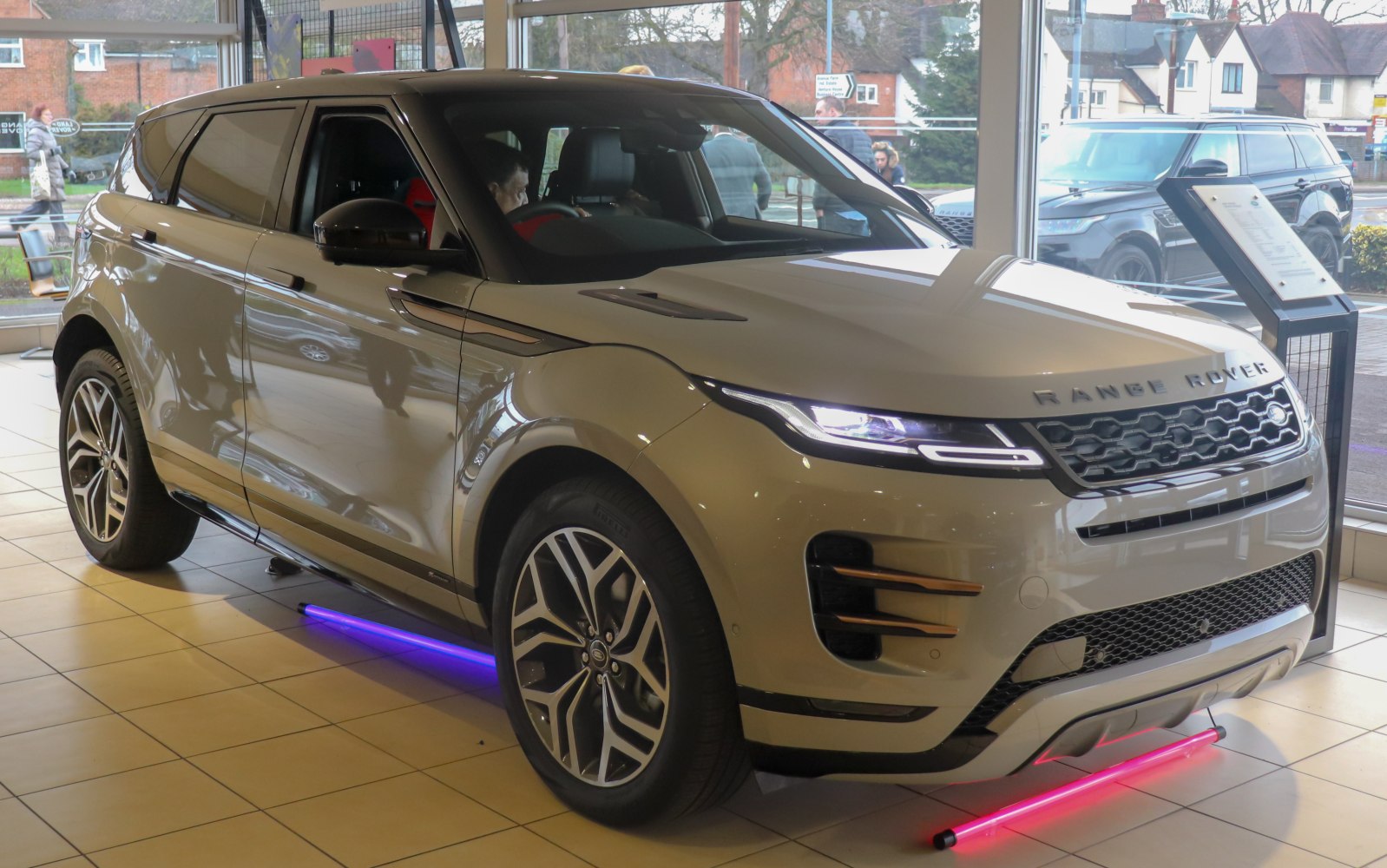 Front-side view with LED headlights and unique alloy wheels