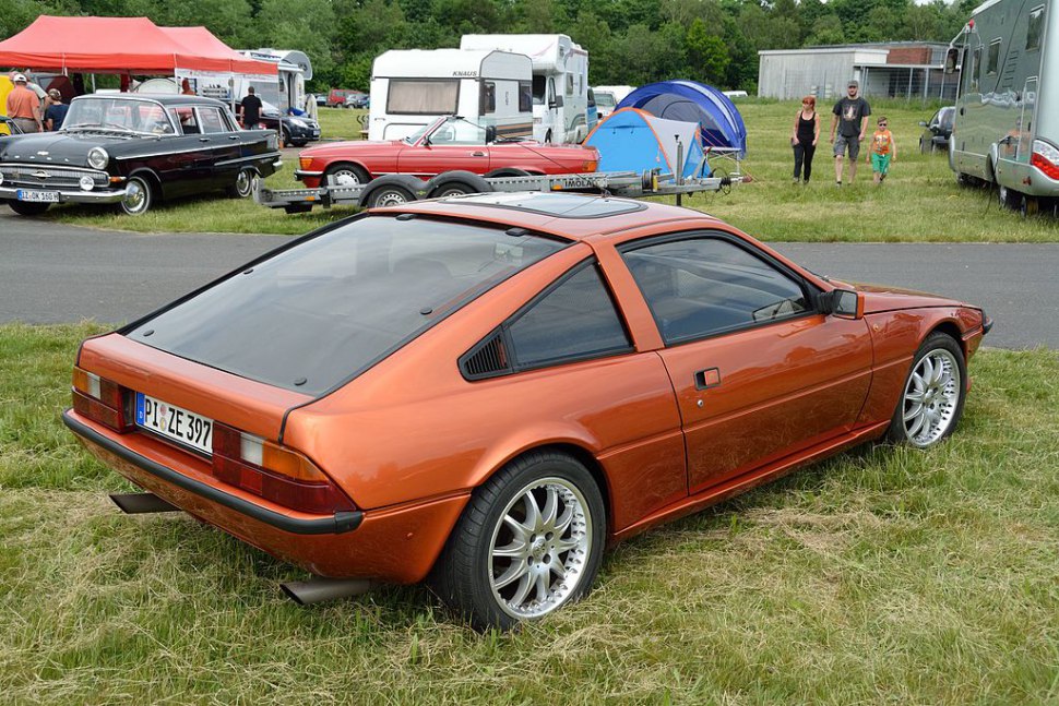 Rear-side view of a hatchback with alloy wheels
