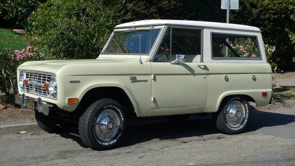 1966 vintage SUV side profile with distinctive boxy shape and rugged tires