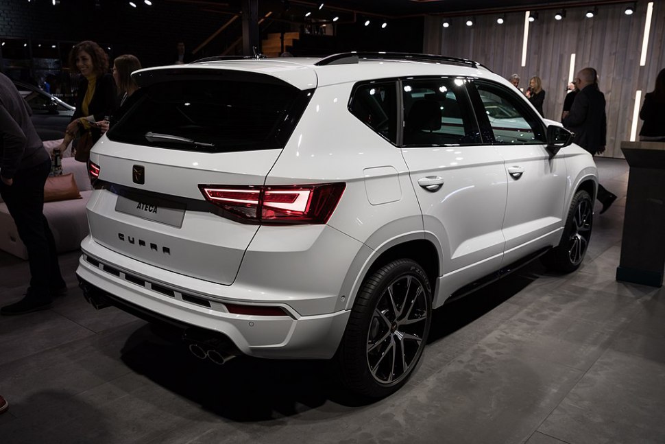 Rear and side view of a white SUV with LED tail lights and sporty alloy wheels