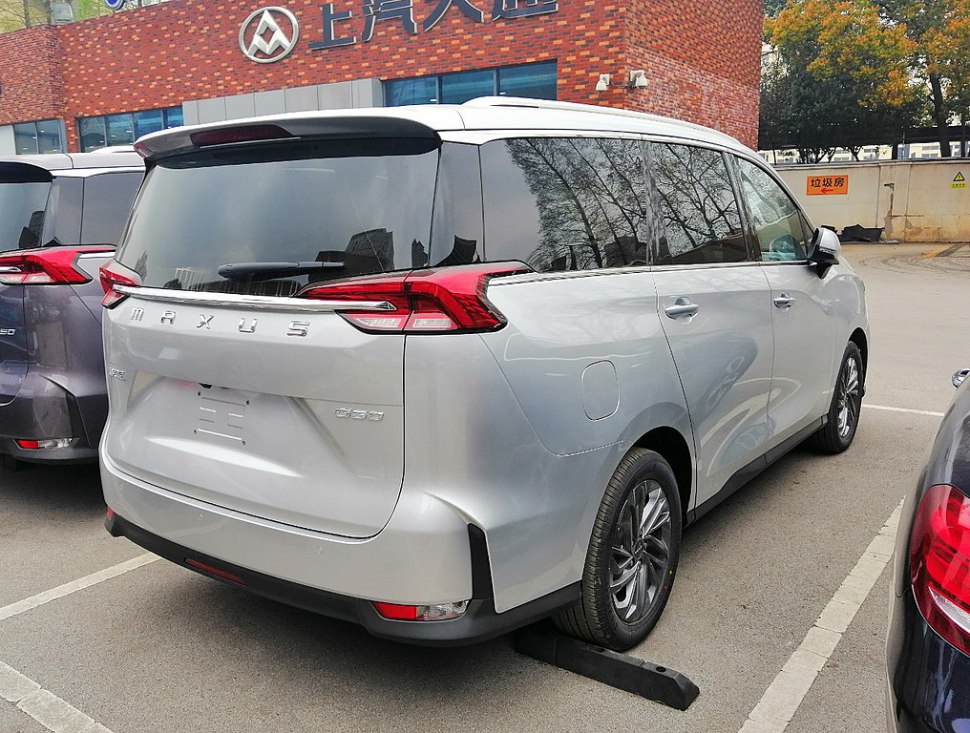 Rear and side view of a modern MPV with distinctive tail lights.