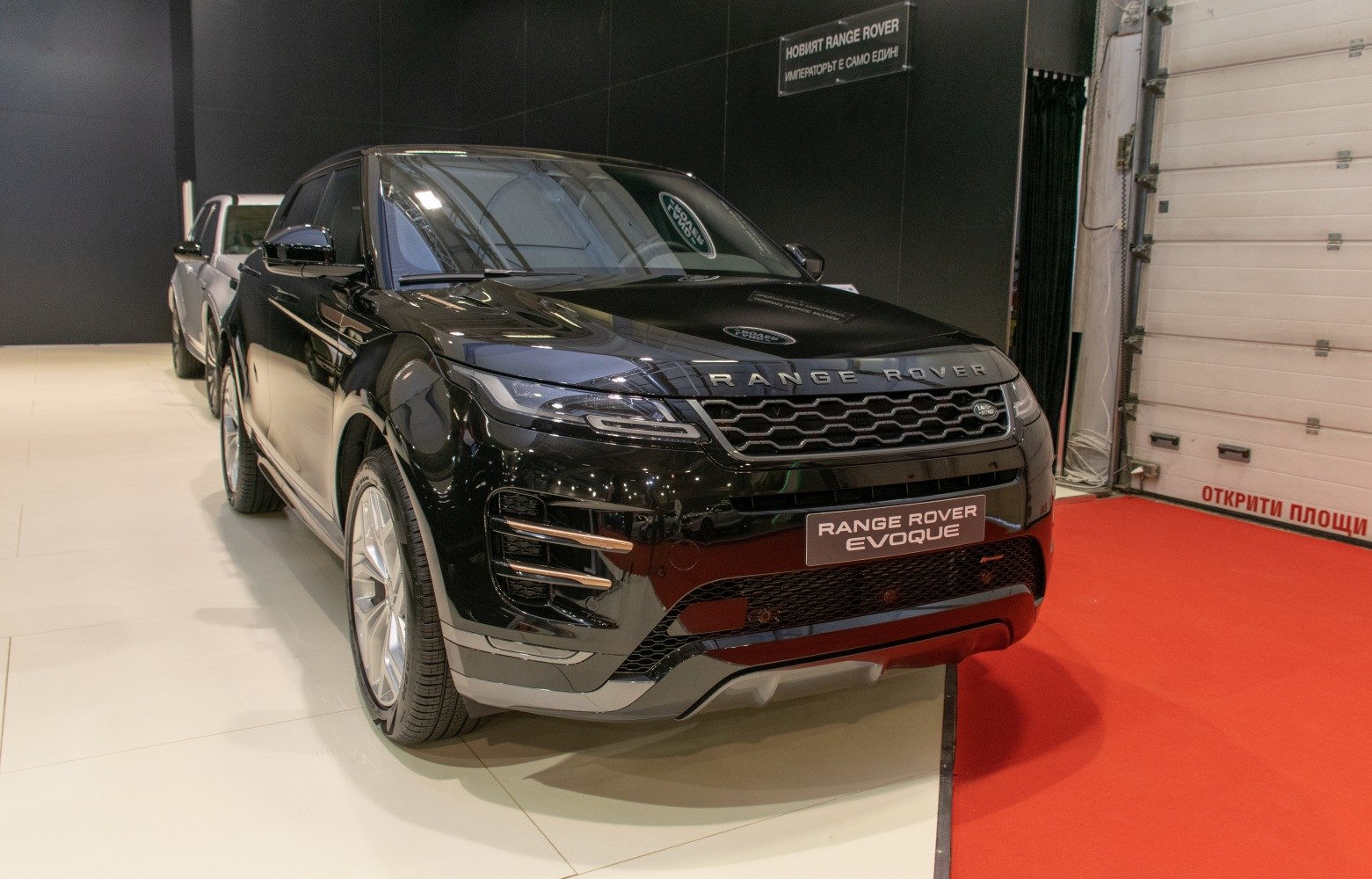 Black SUV with sleek front grille and modern headlights