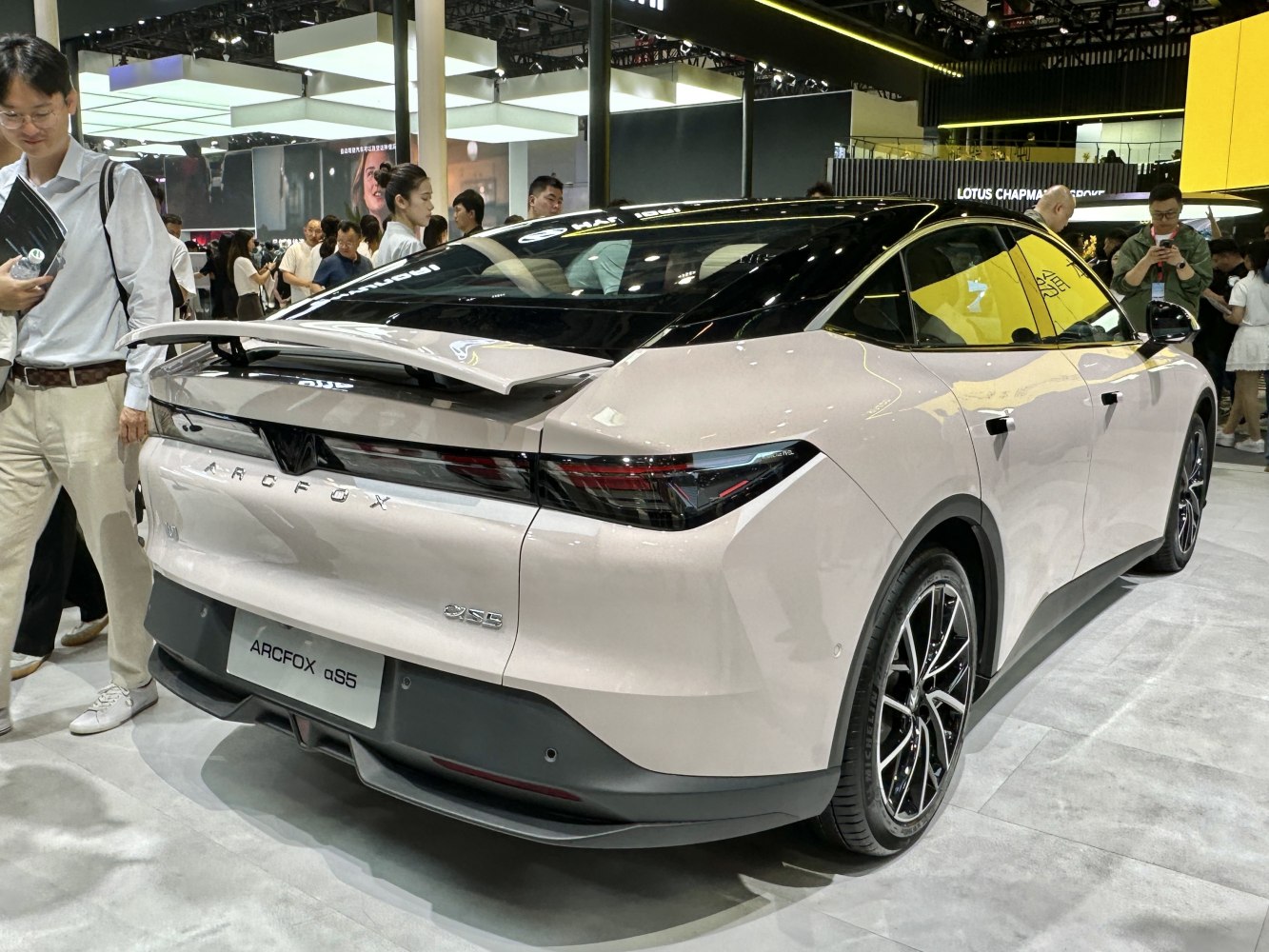 Rear view of a modern vehicle with spoiler and sharp tail lights