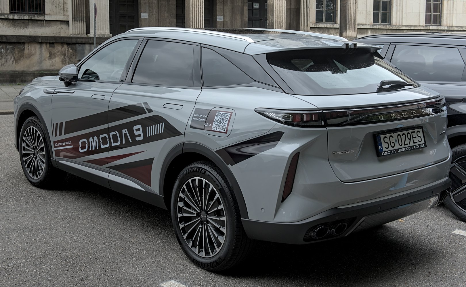 Rear-side view of SUV with sleek taillights and dynamic side graphics