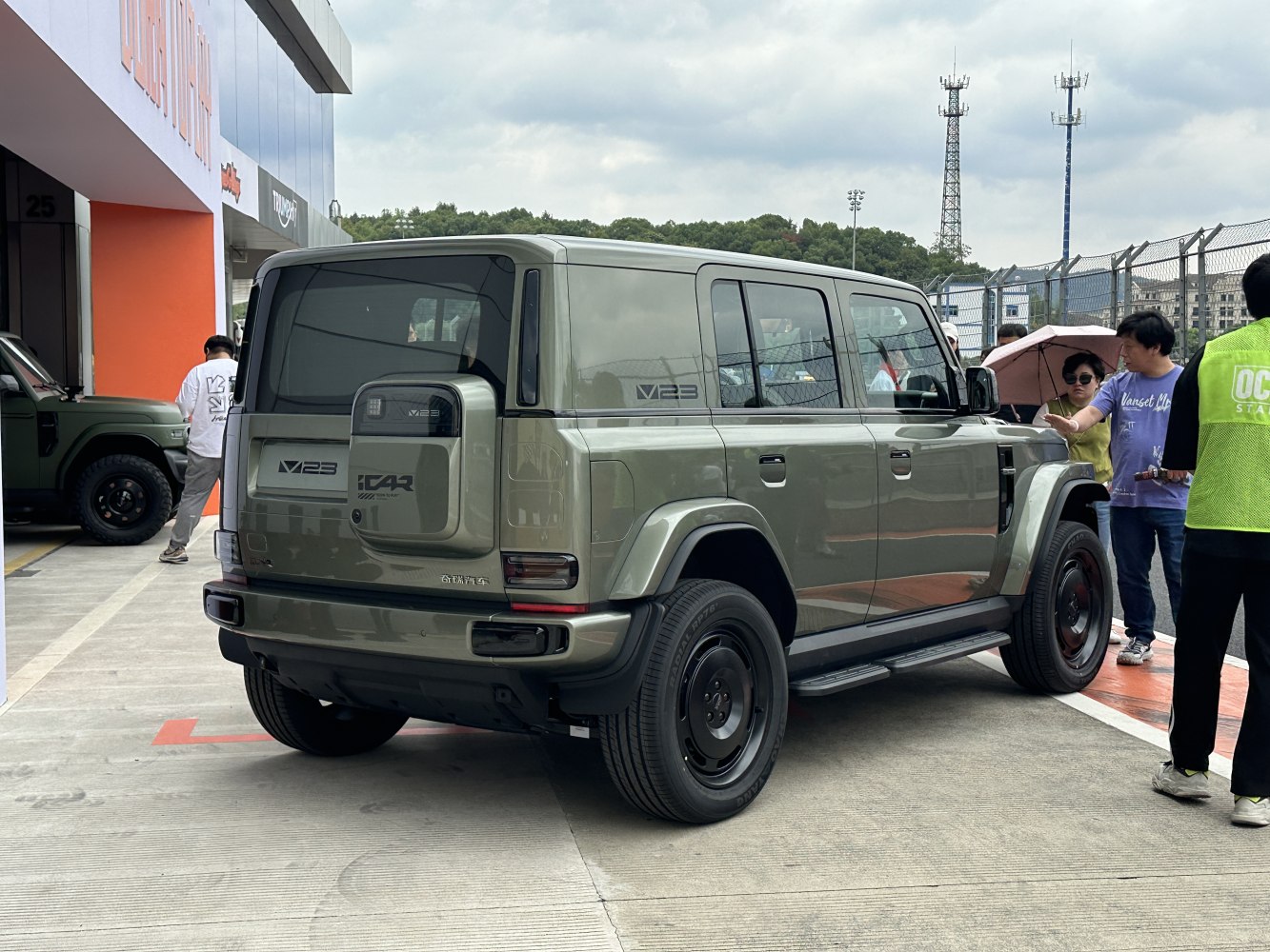 Boxy SUV with rear spare tire cover and black steel wheels