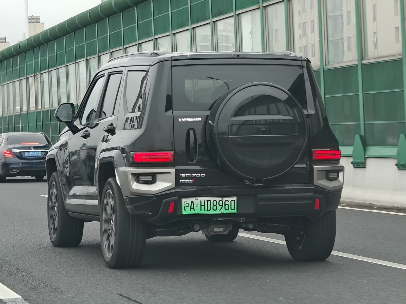 SUV rear with spare tire cover and rectangular LED taillights