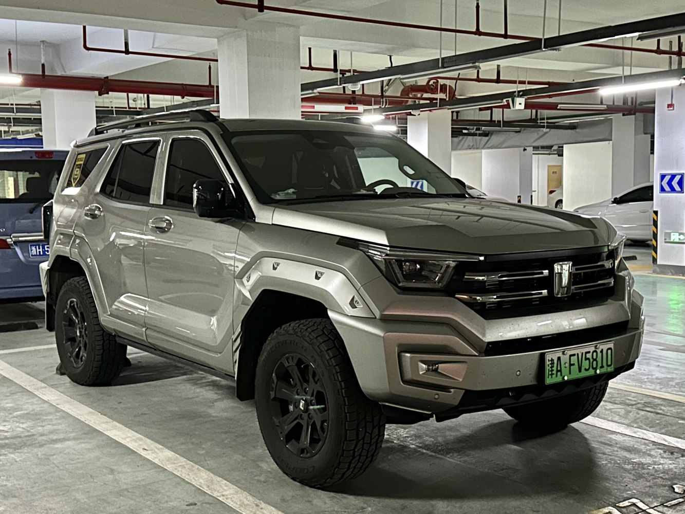 Rugged SUV with off-road tires and angular body design