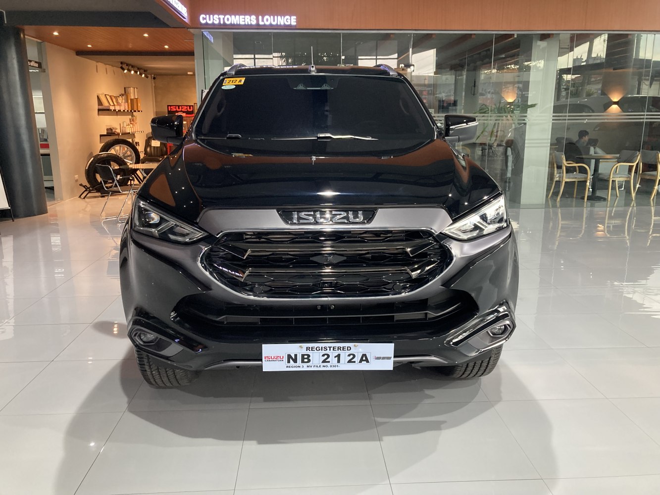 Front view with bold grille and sleek headlights