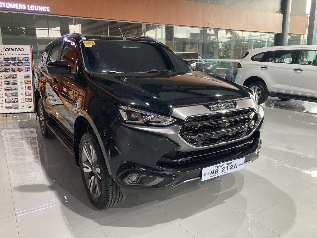 Black SUV with chrome grille and LED headlights