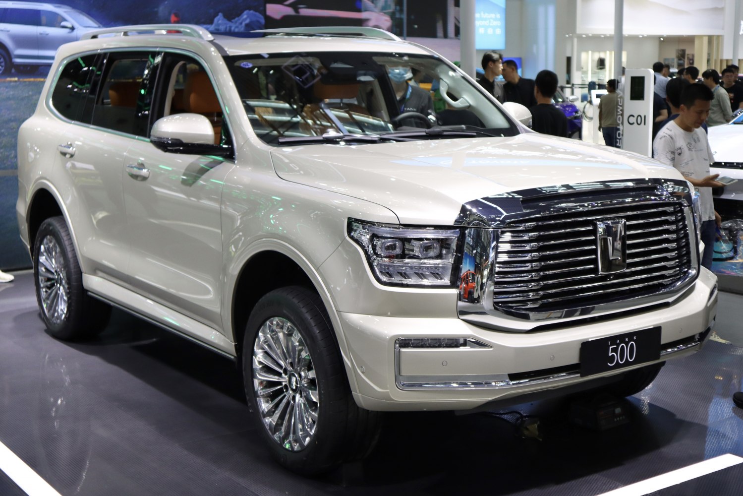 Luxury SUV with large chrome grille and LED headlights