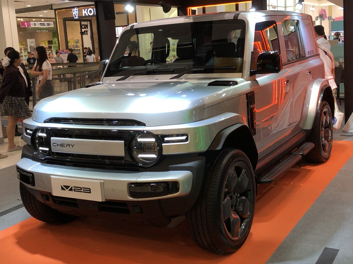 Boxy retro-style SUV with round LED headlights and off-road features