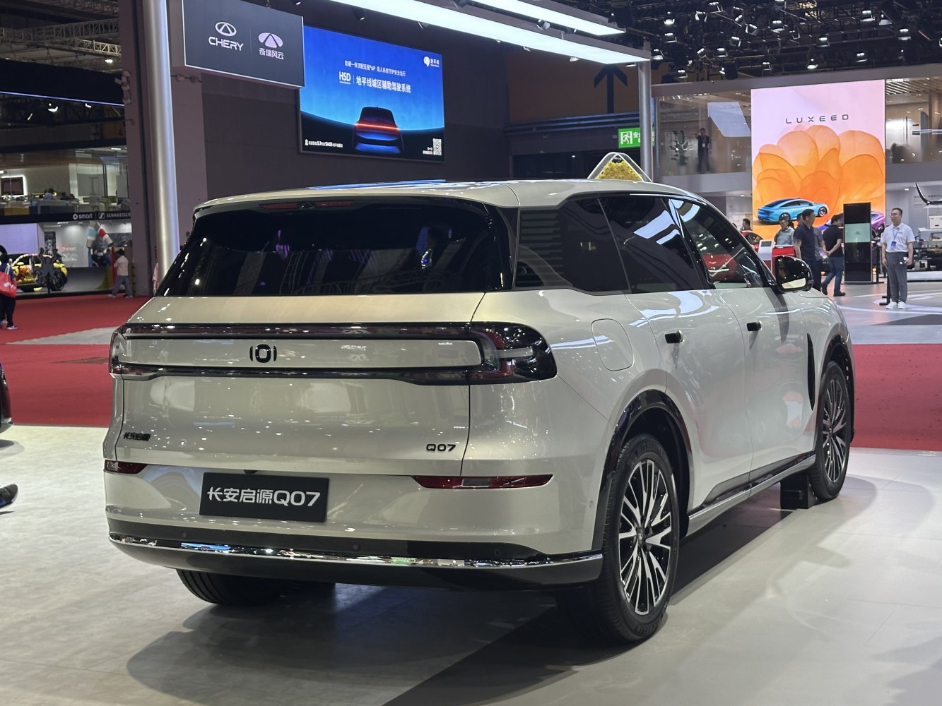 Rear view of modern SUV with horizontal taillights and tinted windows