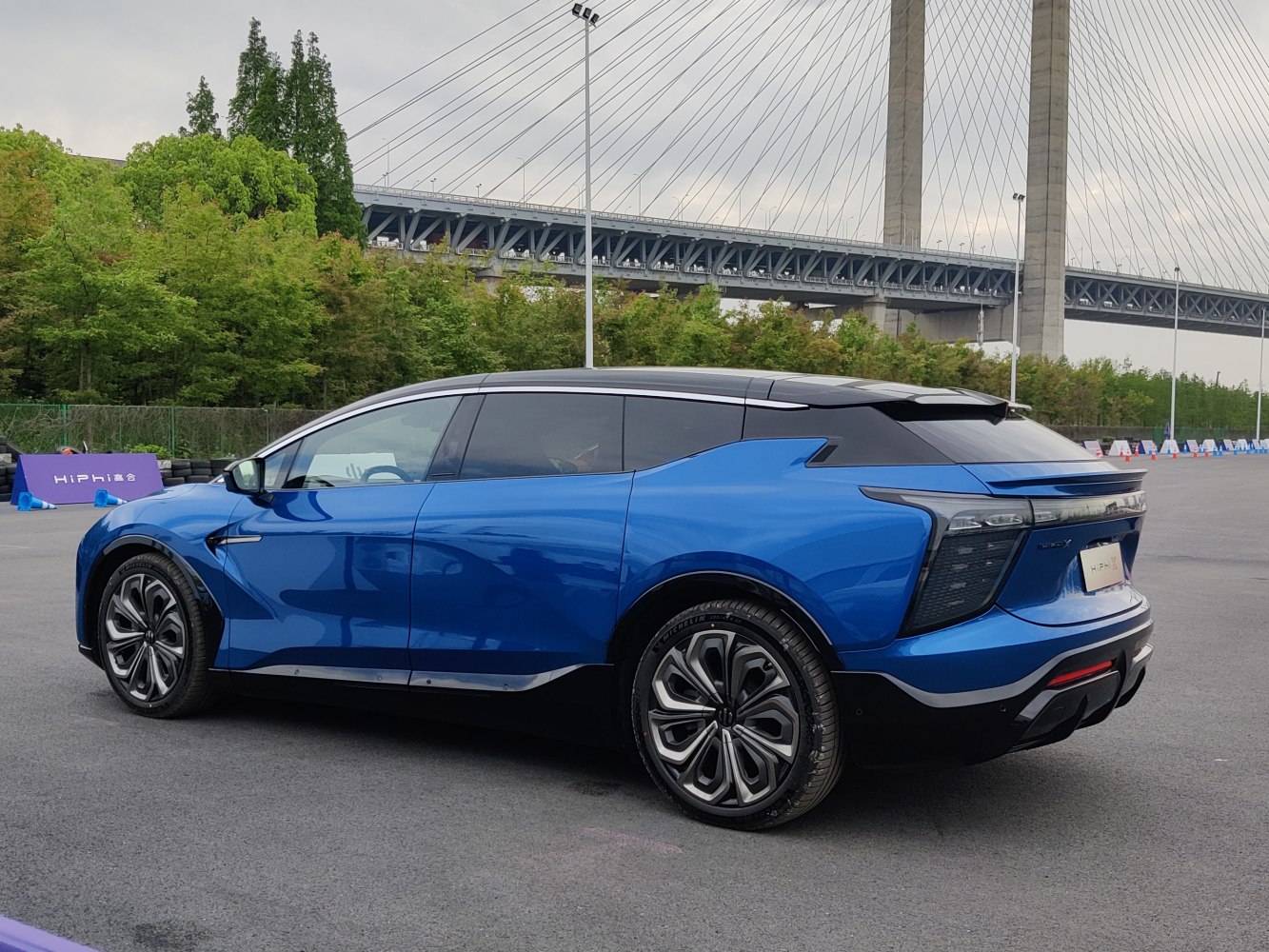 Sleek aerodynamic electric SUV with futuristic rear and modern wheels